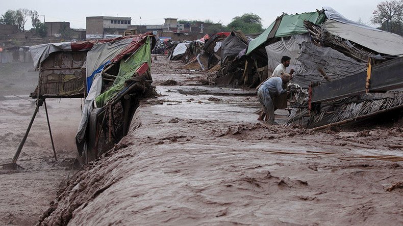 Pakistan floods kill 65, bridge collapse hampers rescue efforts (PHOTOS, VIDEO)
