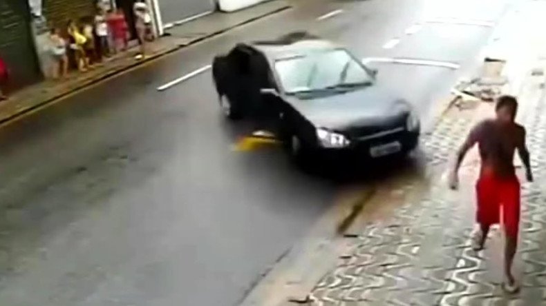 Incredible near-death experience as unwitting pedestrian avoids runaway car (VIDEO)