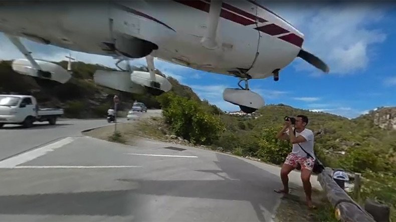 ‘It hit my hand!’: Tourist’s jaw-dropping near miss with airplane (VIDEO)