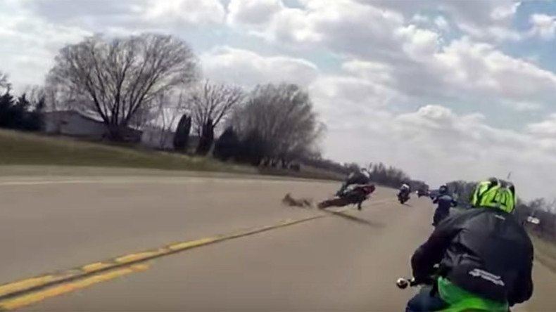 Motorcycle vs dog: Biker hits pooch, narrowly avoids getting hit by truck (VIDEO)