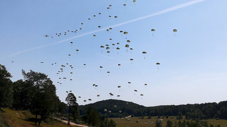 Cloudy with a chance of Humvees: Military vehicles plummet from  sky in failed air drill (VIDEO)