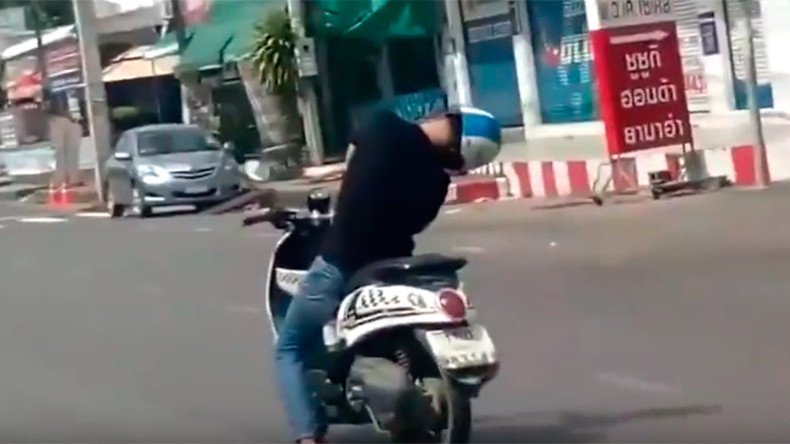 Zombie biker! Sleeping man rides moped through streets of Thailand (VIDEO)