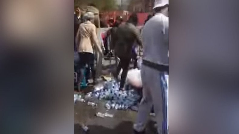 Uproar as London marathon water bottles snatched by roadside (VIDEO)
