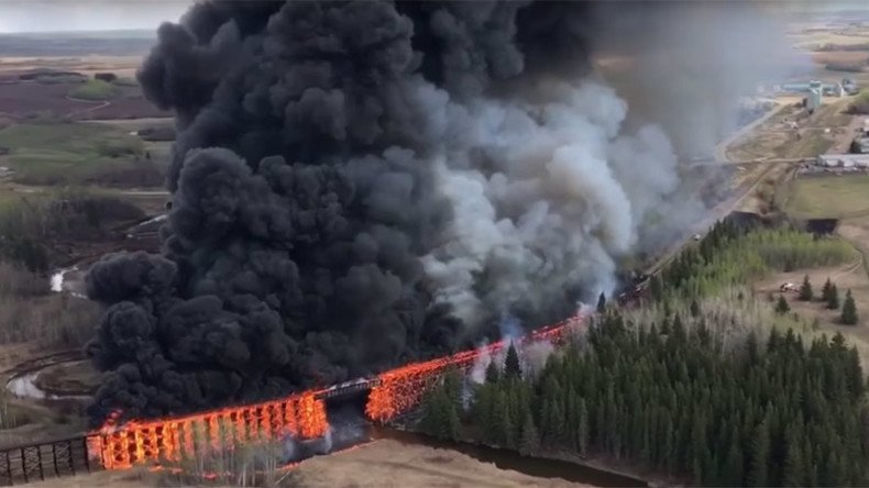 Blaze devours CN Rail bridge: Canadian police suspect arson after 17th fire in 6 days (VIDEO)
