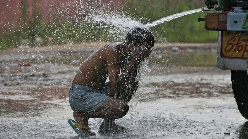 Extreme heat wave kills 300 across South Asia with hottest month still ahead (PHOTOS)
