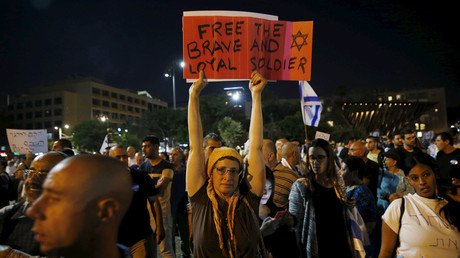 Israelis rally for release of soldier who finished off wounded Palestinian attacker