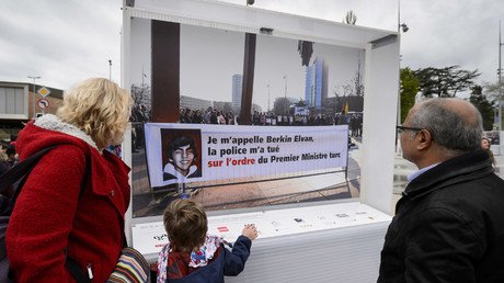 Turkey demands Switzerland remove picture accusing Erdogan of killing boy