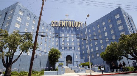 Face-off: Scientology leader threatens to sue his father over tell-all book