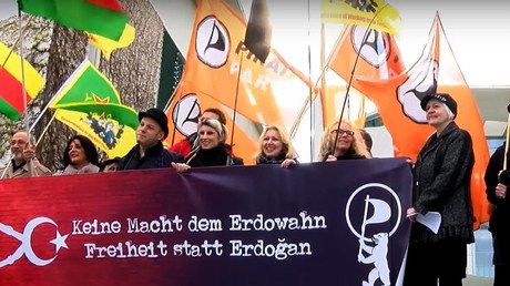 ‘Inconsistency & cowardice’: German activists decry Merkel’s collaboration with ‘despot Erdogan’