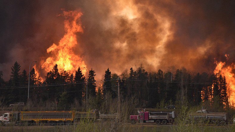 Engulfed by fire: Tens of thousands evacuating from Alberta blaze in Canada (PHOTOS, VIDEOS)