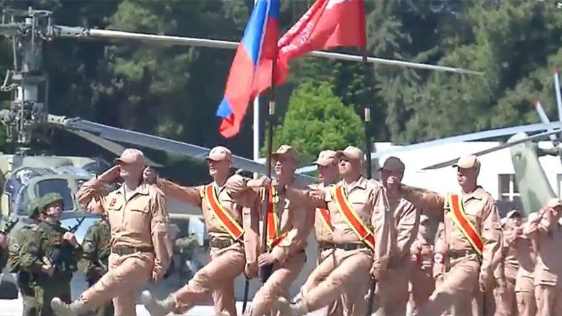 Soviet Victory Banner in Syria: Russian and Syrian troops mark Victory Day at Khmeimim airbase