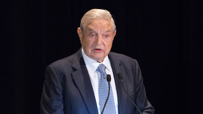 Soros dumps US stocks, buys gold 