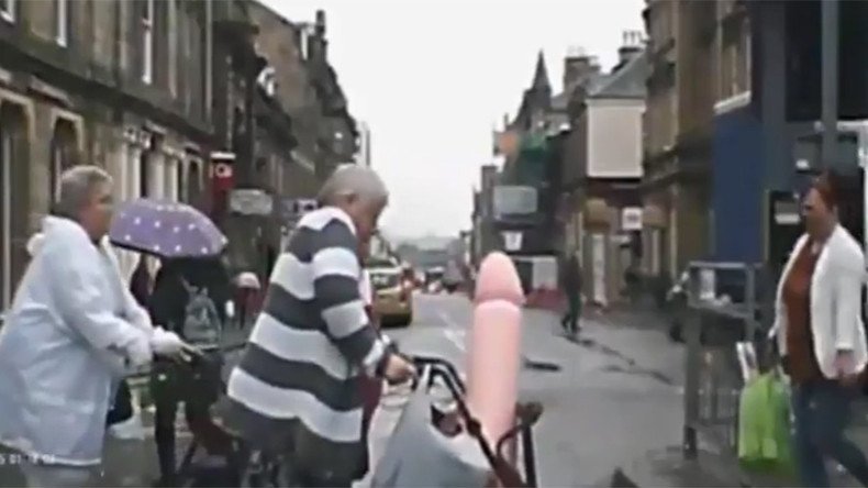 70yo woman pushing giant penis spotted in Scottish town (VIDEO)