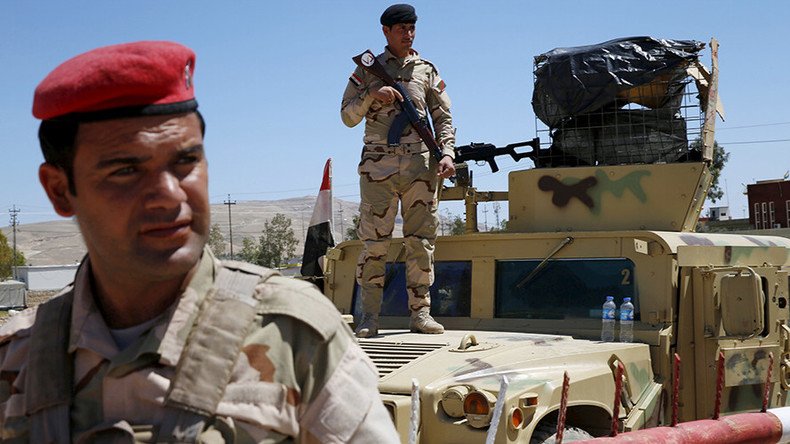 Fallujah civilians told to flee as Iraqi troops prepare to attack ISIS