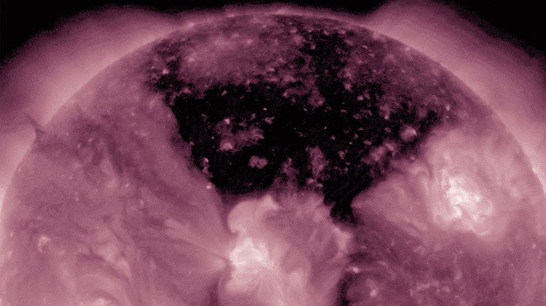 Coronal hole paints sun black in stunning NASA video