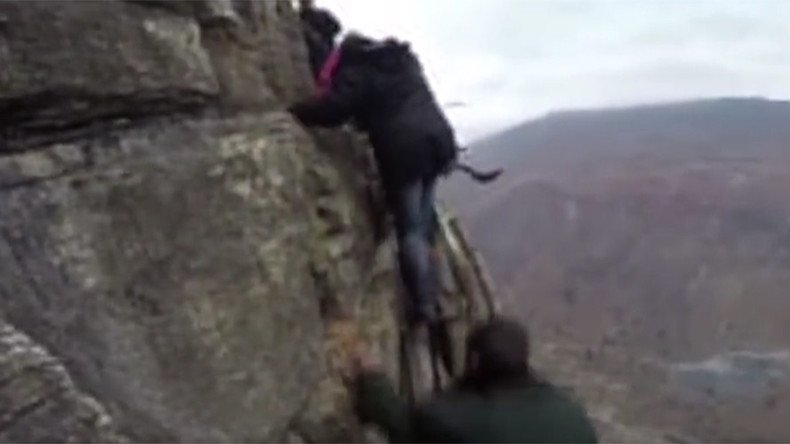 Really high school: Children tackle 800-meter high cliff en route to class (VIDEO) 