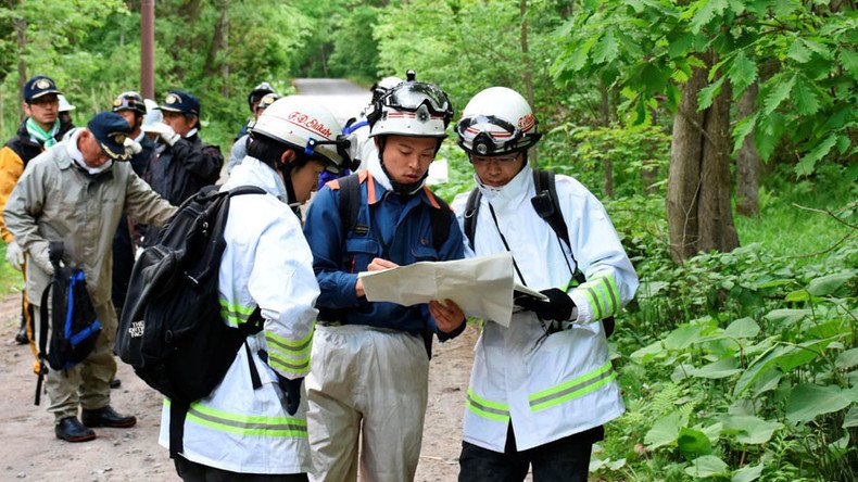 Search widened for Japanese boy missing in mountains abandoned by parents as punishment