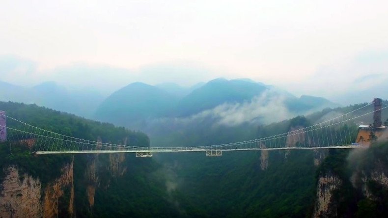 Skywalkers: China builds terrifying glass bridge over giant canyon (VIDEO)