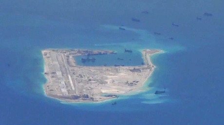 China scrambles fighter jets, warships after US destroyer sails near disputed reef