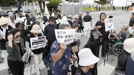 Okinawans protest murder by ex-Marine ahead of Obama’s Japan visit