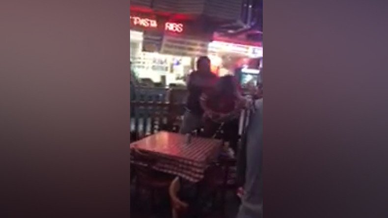 Newly released video shows off-duty cop punching restaurant patron in face