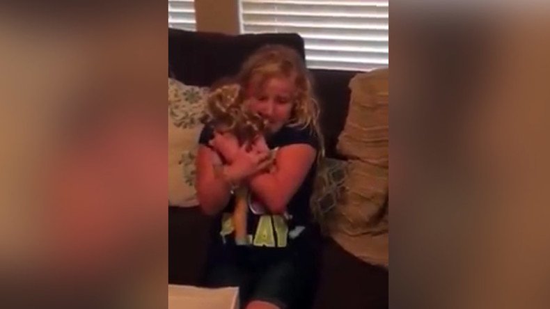 Young girl has tears of joy after receiving doll with prosthetic leg like hers (VIDEO)