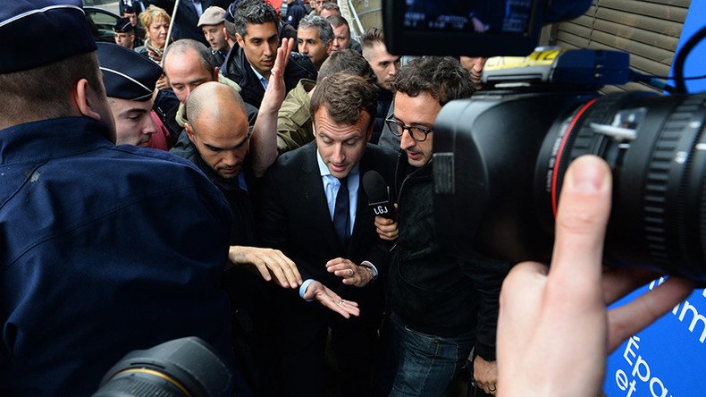 'Get lost!' French economy minister pelted with eggs amid labor reform strikes (VIDEO)
