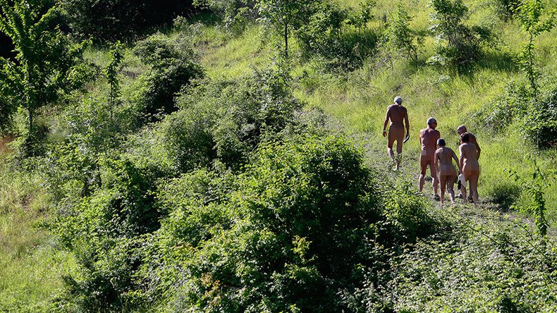 Naked & afraid: German nudist colony protests refugee shelter over safety concerns