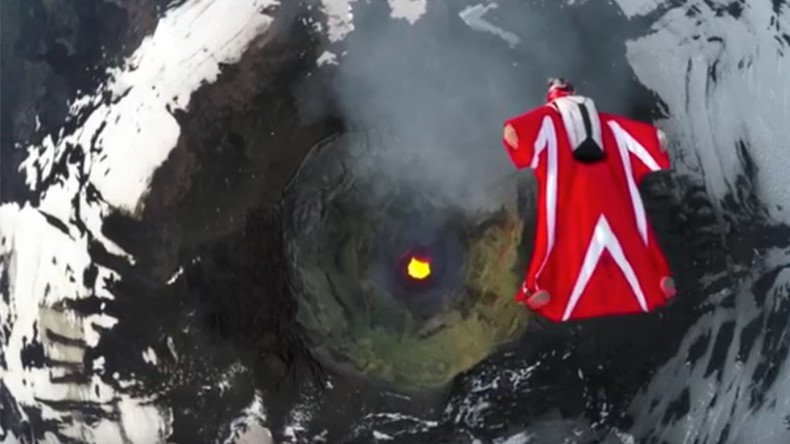 Model basejump: Extreme adrenaline junkie stages wingsuit flight over active volcano (VIDEO)