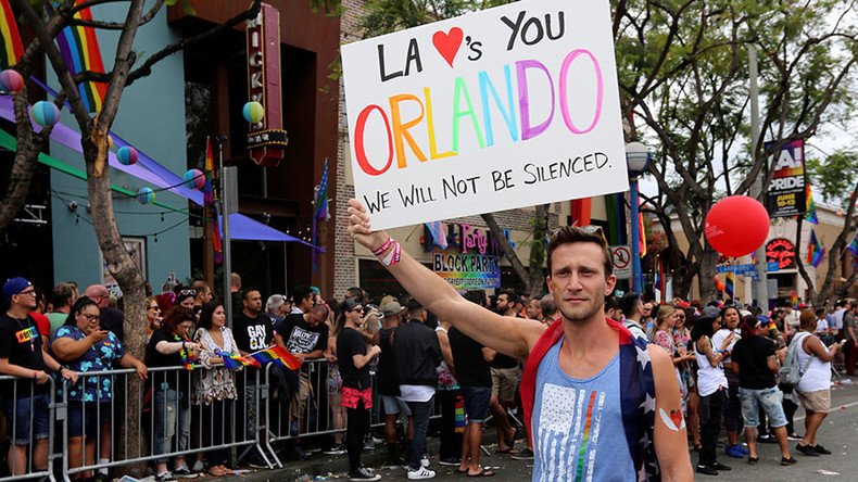‘World is a worse place today’: Bittersweet LA Pride celebrations go on despite Orlando tragedy