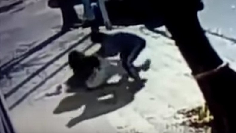 CCTV films man tackling woman to the ground in bid to take her baby (VIDEO)