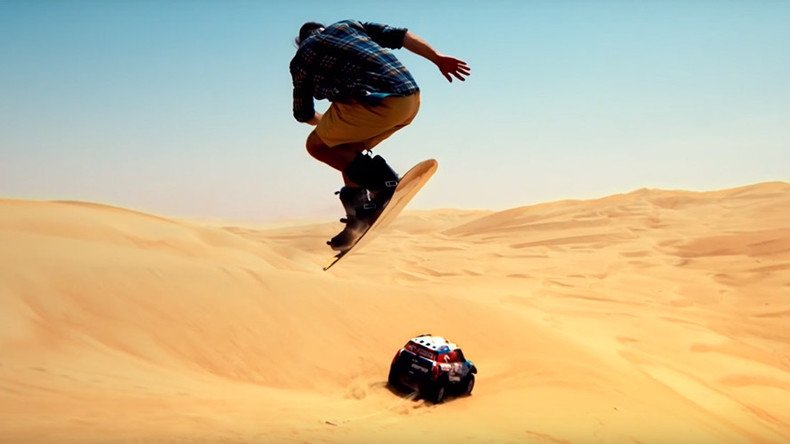Dune shredder: Snowboarder tears up desert with Dakar rally speedster (VIDEO)