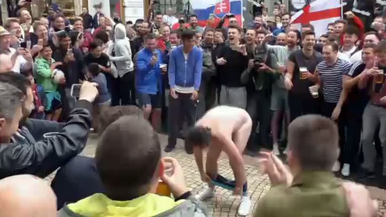 Fans in the flesh: England supporters strip down to cheer on football team (VIDEO)