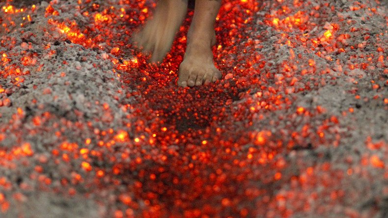 Burning, man! Scores of scorched feet at Tony Robbins firewalk in Dallas