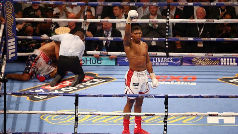 Anthony Joshua knocks out Dominic Breazeale in round 7 to retain world title