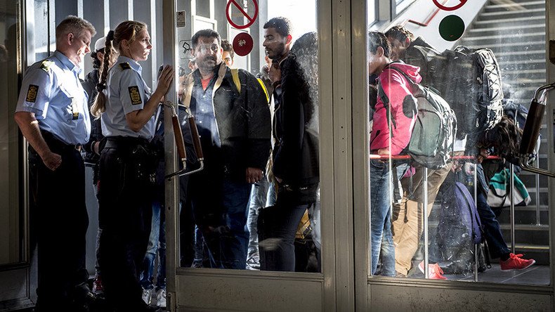 Denmark seizes cash from asylum seekers for first time under new law  
