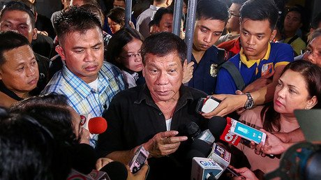 465 slain in July: Drug pushers purged in Philippines after presidential plea