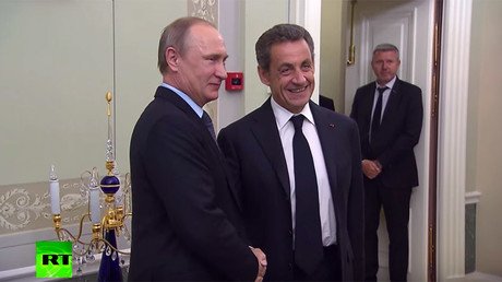 ‘You can now speak with frankness’: Putin welcomes former French leader Sarkozy in St. Petersburg
