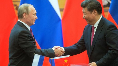 Russia, China approve business initiatives worth $50bn during Putin visit