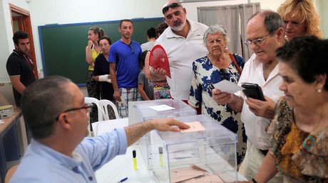 Spain's Conservative PP wins rerun election, Podemos upset by surprisingly low results