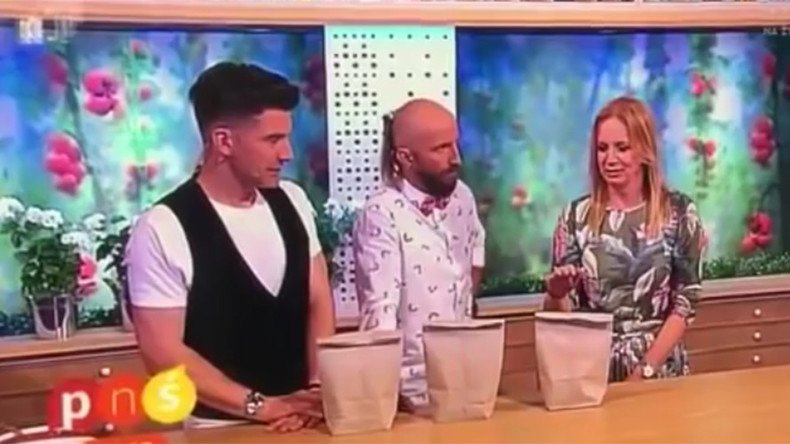 Polish TV host gets hand stabbed by nail as magic trick goes horribly wrong (VIDEO)