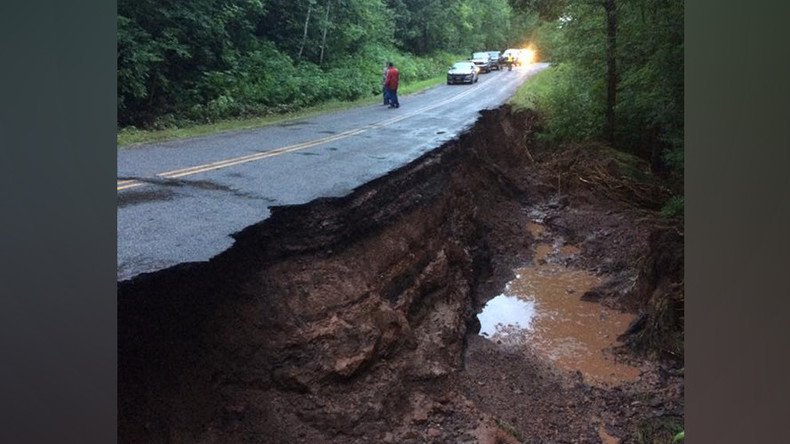 Wisconsin tornado warning issued as floodwater washes away harbor, chunks of road (PHOTOS)