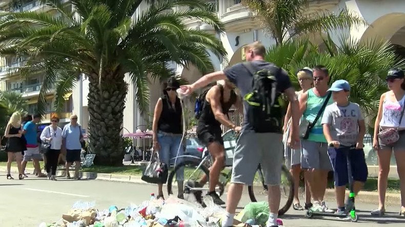 A heap of hate: People spit, throw garbage onto spot where Nice attacker was shot (VIDEOS, PHOTOS)