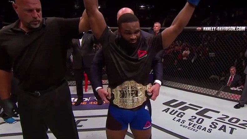 Woodley stuns Lawler to claim UFC welterweight title