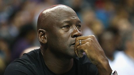 'It's PENNIES for his brand': Michael Jordan pledges $100 million to fight 'ingrained racism'... but it's a FRACTION of his wealth