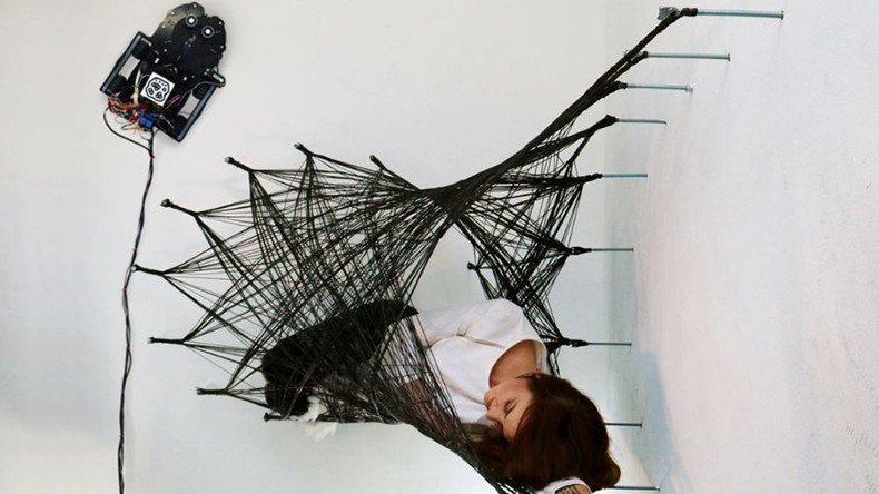 Incredible ceiling-crawler robots weave human wall ‘cocoon’ (VIDEO)