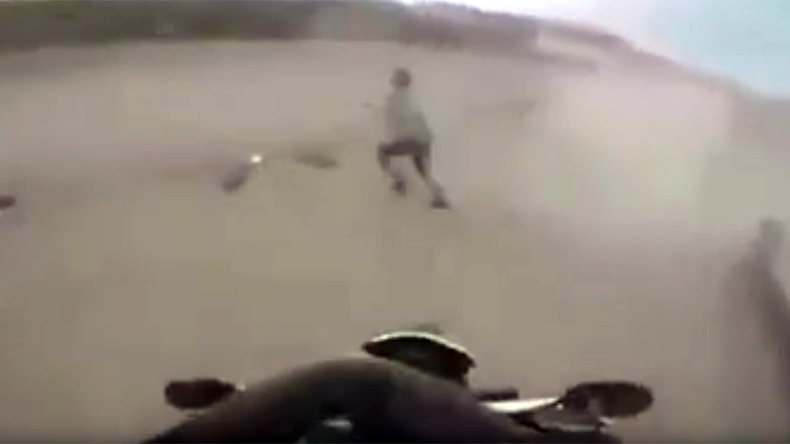 Helmet-cam: Motor-cop rides ON TO fleeing suspect, nails it (VIDEO)