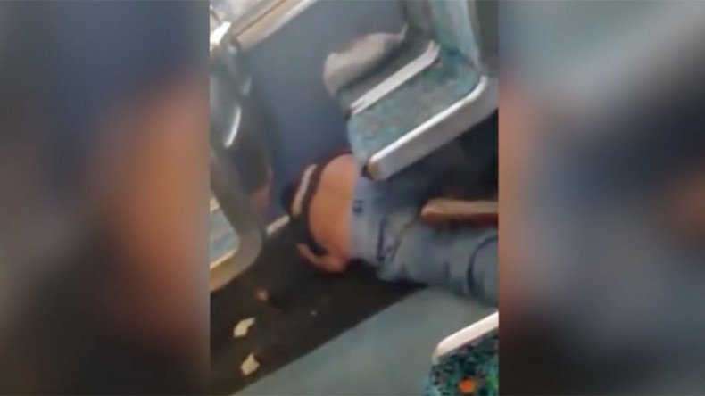 Woman beats up train passenger in California over alleged racist abuse (GRAPHIC VIDEO)