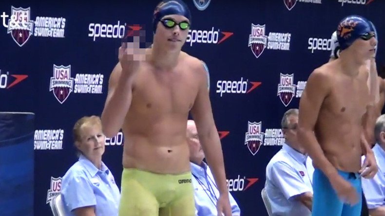 Canadian swimmer flips his father the middle finger before every race