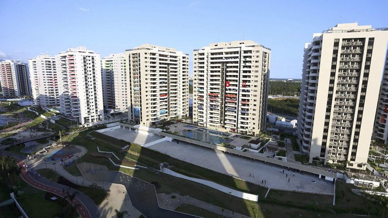 Russian flags torn down in Olympic village